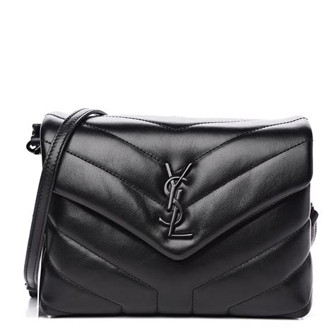 small black ysl purse.